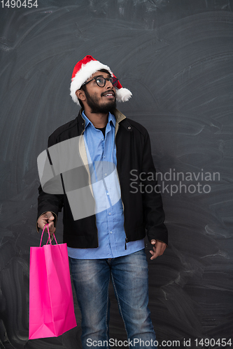 Image of Indian Santa with shopping bags