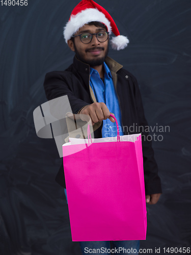 Image of Indian Santa with shopping bags