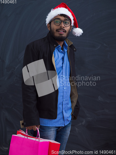 Image of Indian Santa with shopping bags