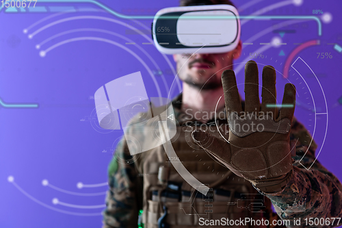 Image of soldier using  virtual reality headset purple background