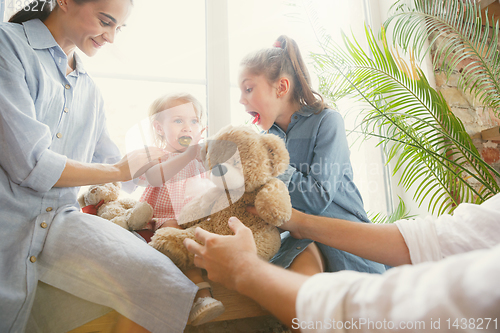 Image of Adult family moved to a new house or apartment