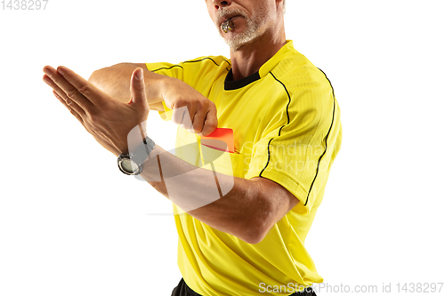 Image of Football referee showing a red card to a displeased player isolated on white background