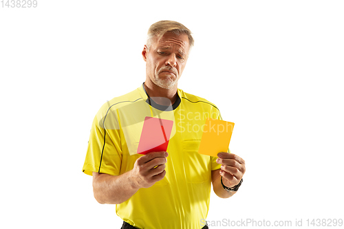 Image of Football referee showing a red card to a displeased player isolated on white background