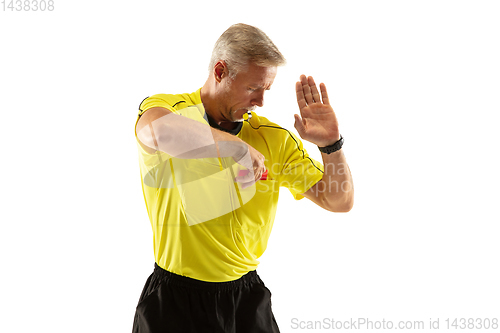 Image of Football referee showing a red card to a displeased player isolated on white background