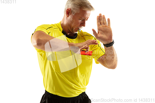 Image of Football referee showing a red card to a displeased player isolated on white background