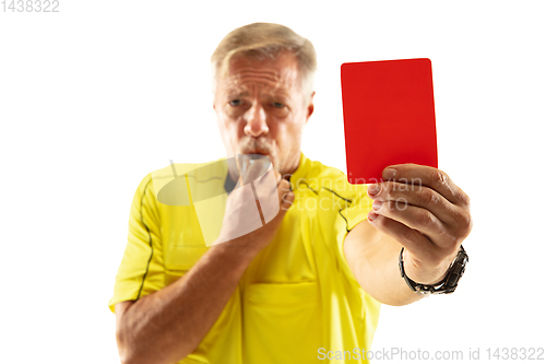 Image of Football referee showing a red card to a displeased player isolated on white background