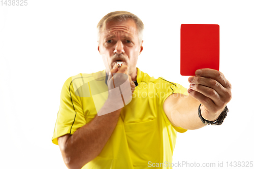 Image of Football referee showing a red card to a displeased player isolated on white background