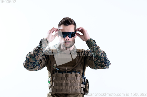 Image of soldier preparing gear for action