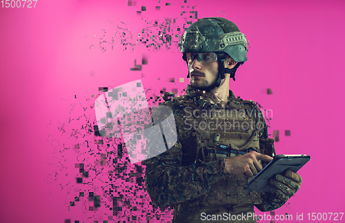 Image of soldier using tablet computer closeup