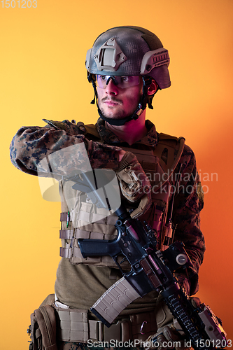 Image of modern soldier against yellow background