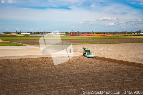 Image of Tractor in a Field