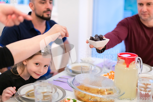 Image of Eid Mubarak islamic family have Iftar dinner during Ramadan fest