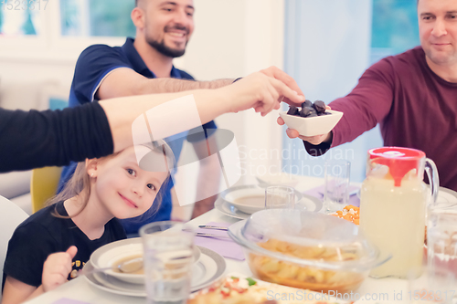 Image of Eid Mubarak islamic family have Iftar dinner during Ramadan fest