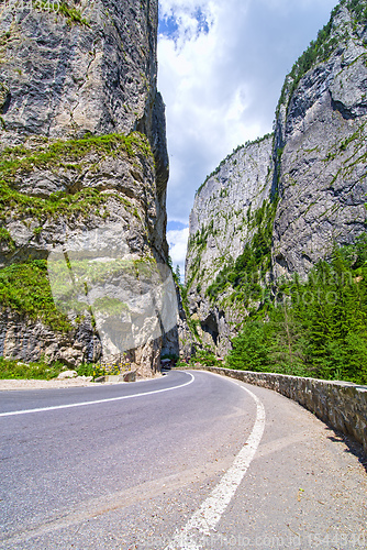 Image of Curvy road through huge canyon