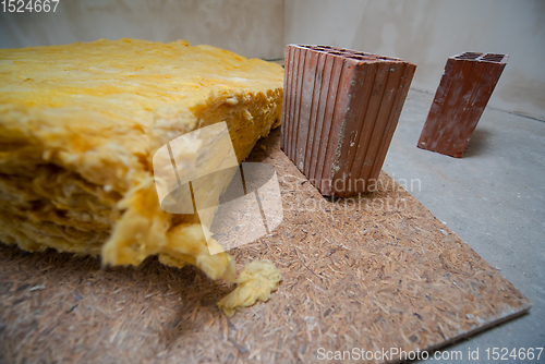 Image of red Bricks and glass wool