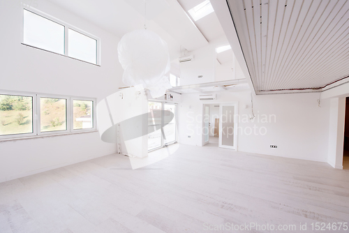 Image of Interior of empty stylish modern open space two level apartment