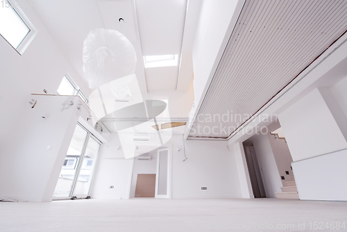 Image of Interior of empty stylish modern open space two level apartment