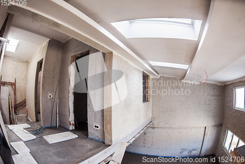 Image of interior of construction site with white drywall