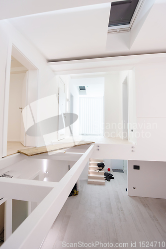 Image of Interior of empty stylish modern open space two level apartment