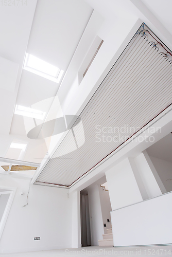 Image of Interior of empty stylish modern open space two level apartment