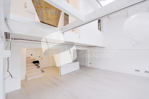 Image of Interior of empty stylish modern open space two level apartment