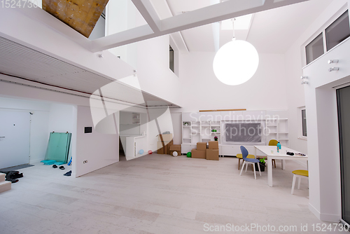 Image of Interior of empty stylish modern open space two level apartment