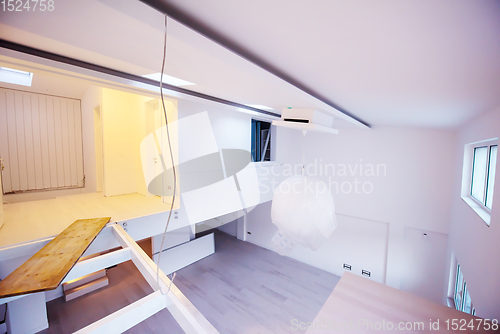 Image of Interior of empty stylish modern open space two level apartment