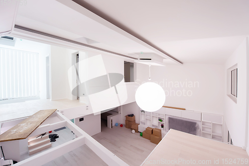 Image of Interior of empty stylish modern open space two level apartment