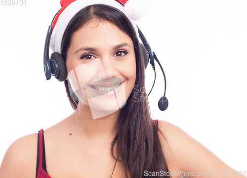 Image of Christmas headset woman from telemarketing call center wearing red santa hat talking smiling isolated on white background.