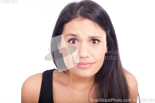 Image of Close up portrait of pretty surprised woman  on white background