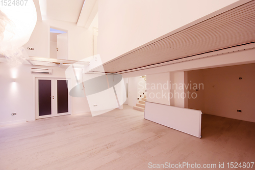 Image of Interior of empty stylish modern open space two level apartment