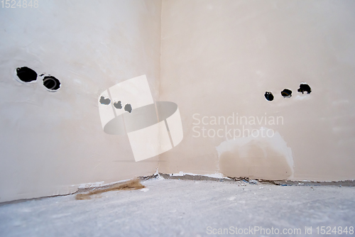 Image of interior of construction site with white drywall