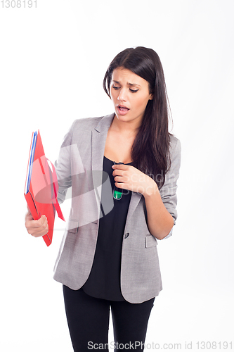 Image of beautiful young businesswoman with a red folder