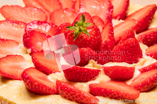 Image of homemade strawberry cake in a red dish