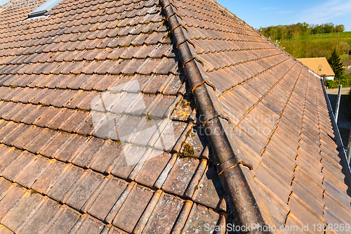 Image of renovation of a brick tiled roof