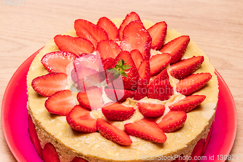 Image of homemade strawberry cake in a red dish