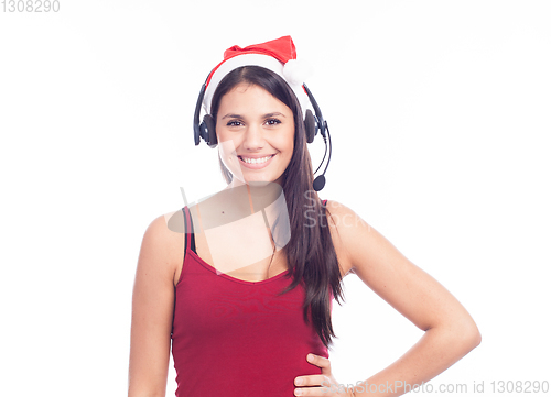 Image of Christmas headset woman from telemarketing call center wearing red santa hat talking smiling isolated on white background.