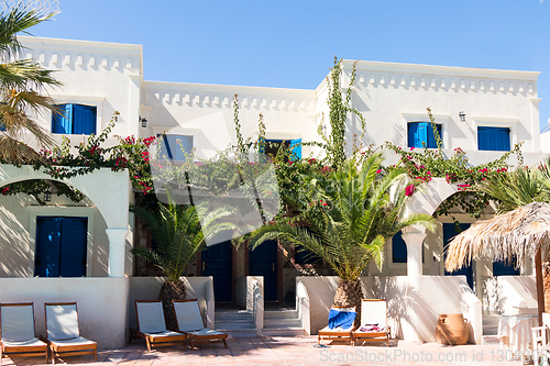Image of private pool and sun loungers in the sun