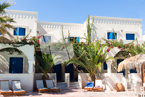 Image of private pool and sun loungers in the sun