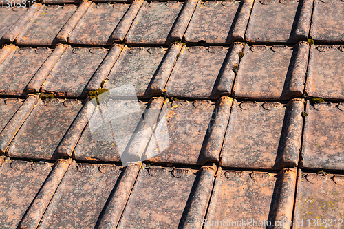 Image of renovation of a brick tiled roof