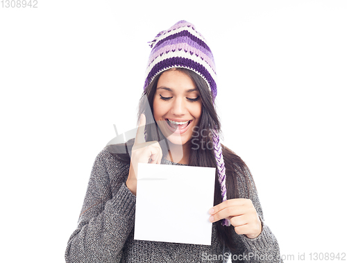 Image of portrait of young woman with a sweater and Peruvian hat woolen h