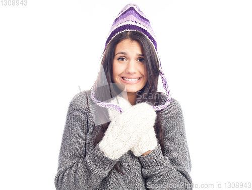 Image of pretty brunette woman with a woolen Peruvian hat a sweater and g