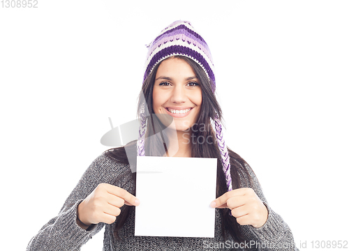 Image of portrait of young woman with a sweater and Peruvian hat woolen h