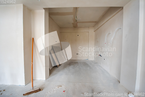 Image of interior of construction site with white drywall