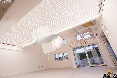 Image of Interior of empty stylish modern open space two level apartment