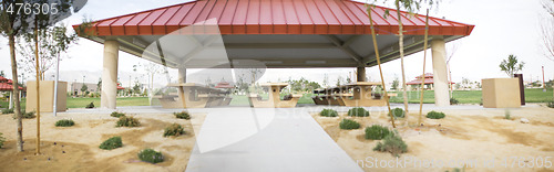 Image of panoramic of park and picnic tables