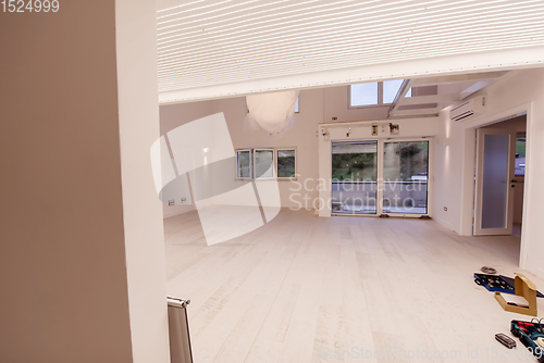 Image of Interior of empty stylish modern open space two level apartment