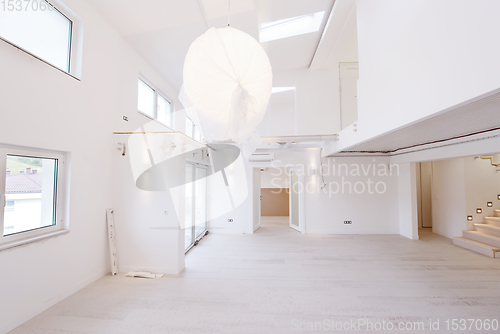 Image of Interior of empty stylish modern open space two level apartment