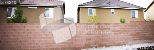 Image of panoramic houses and brick wall