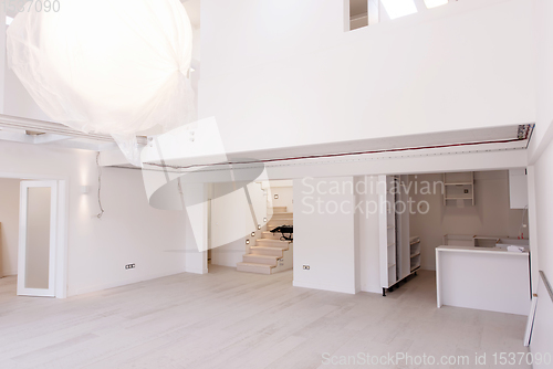 Image of Interior of empty stylish modern open space two level apartment